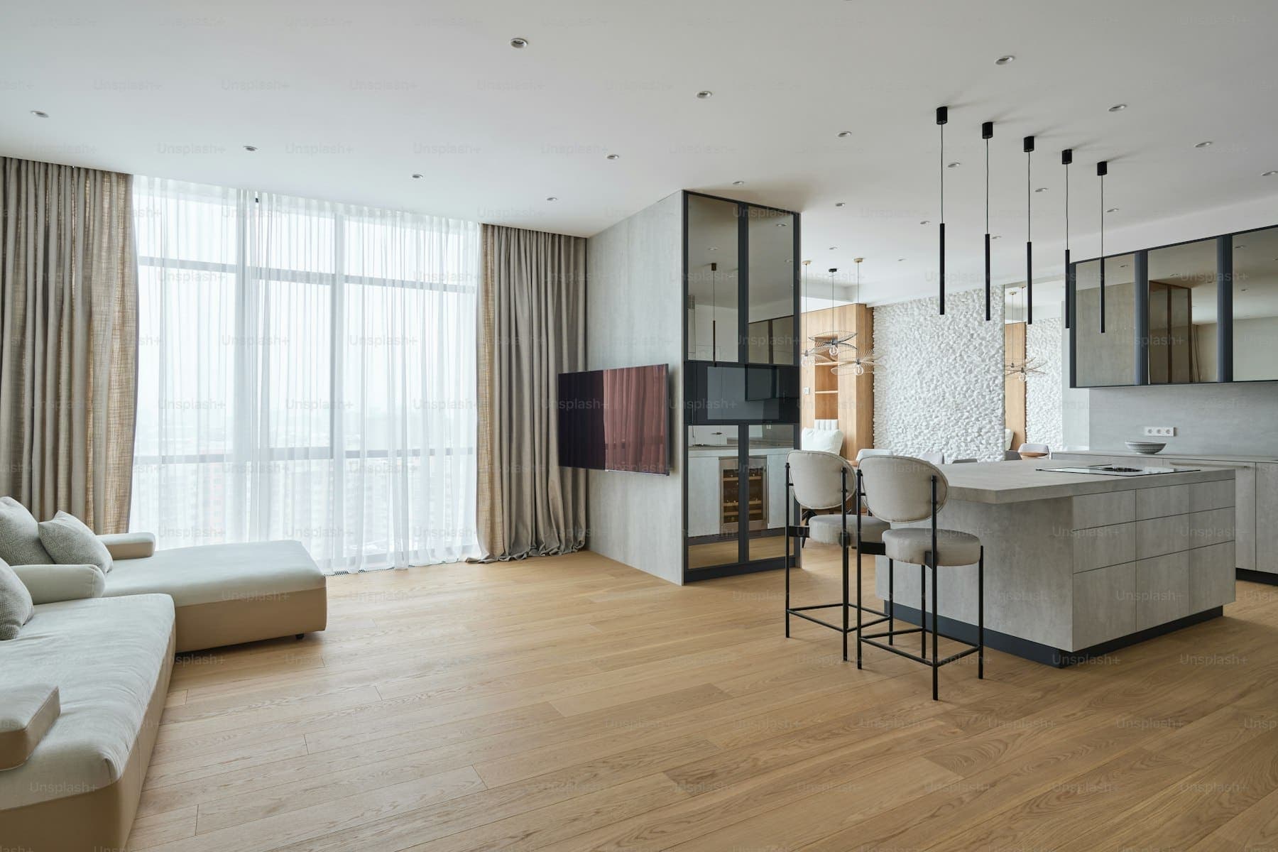 Wide-plank luxury vinyl flooring running through an open room