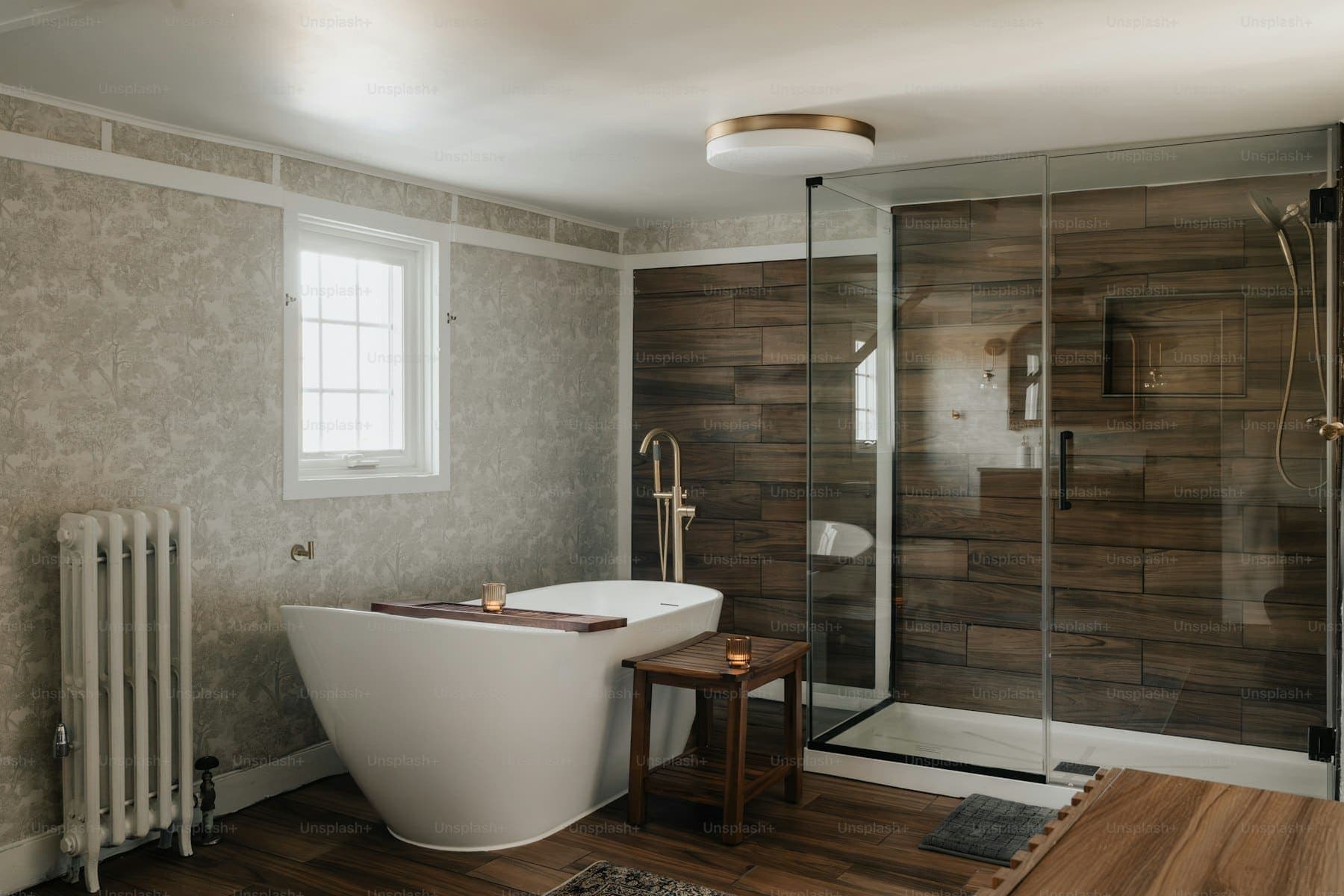 Renovated bathroom with a glass walk-in shower and floating vanity
